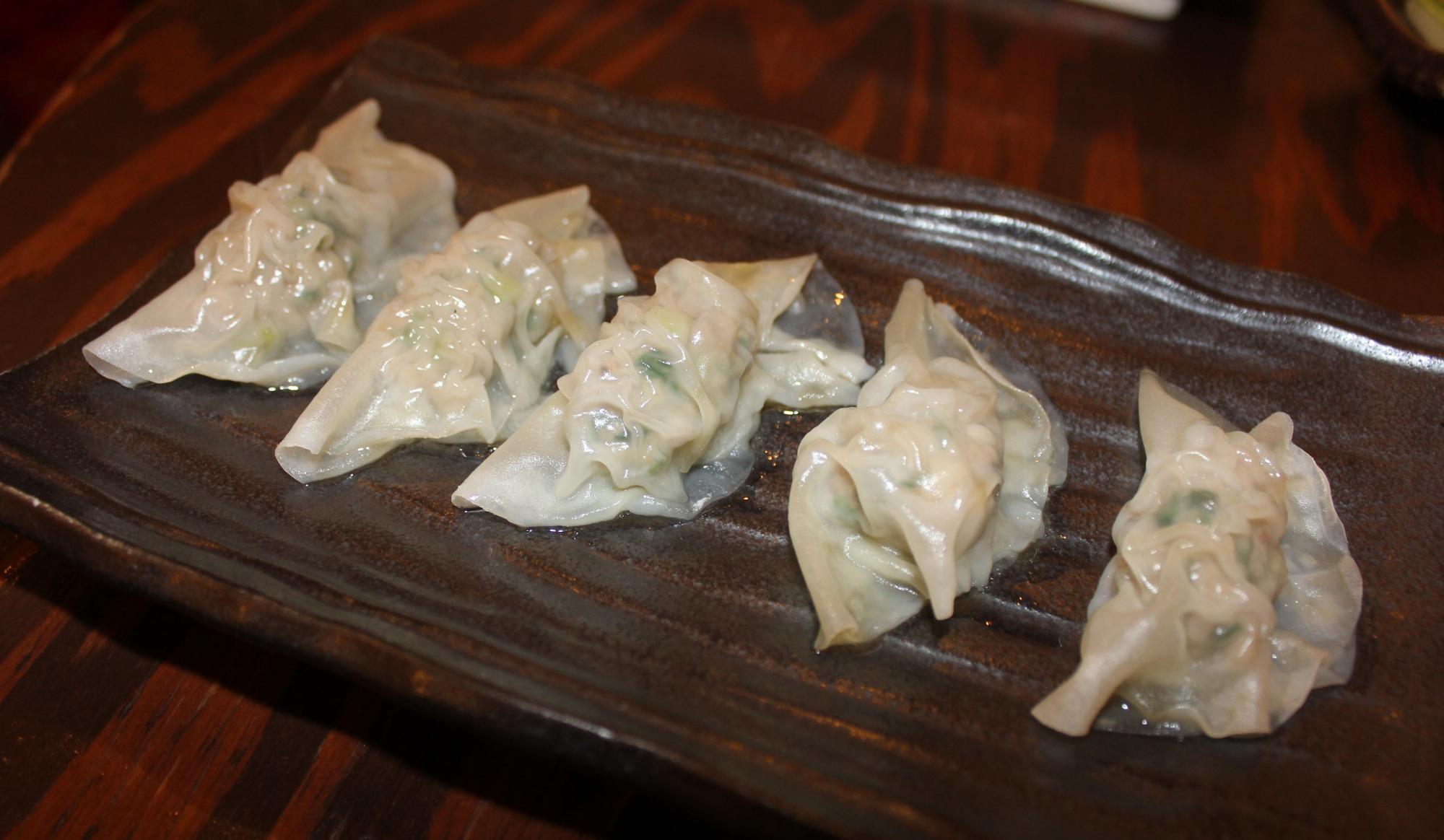 看板メニューの蒸し餃子