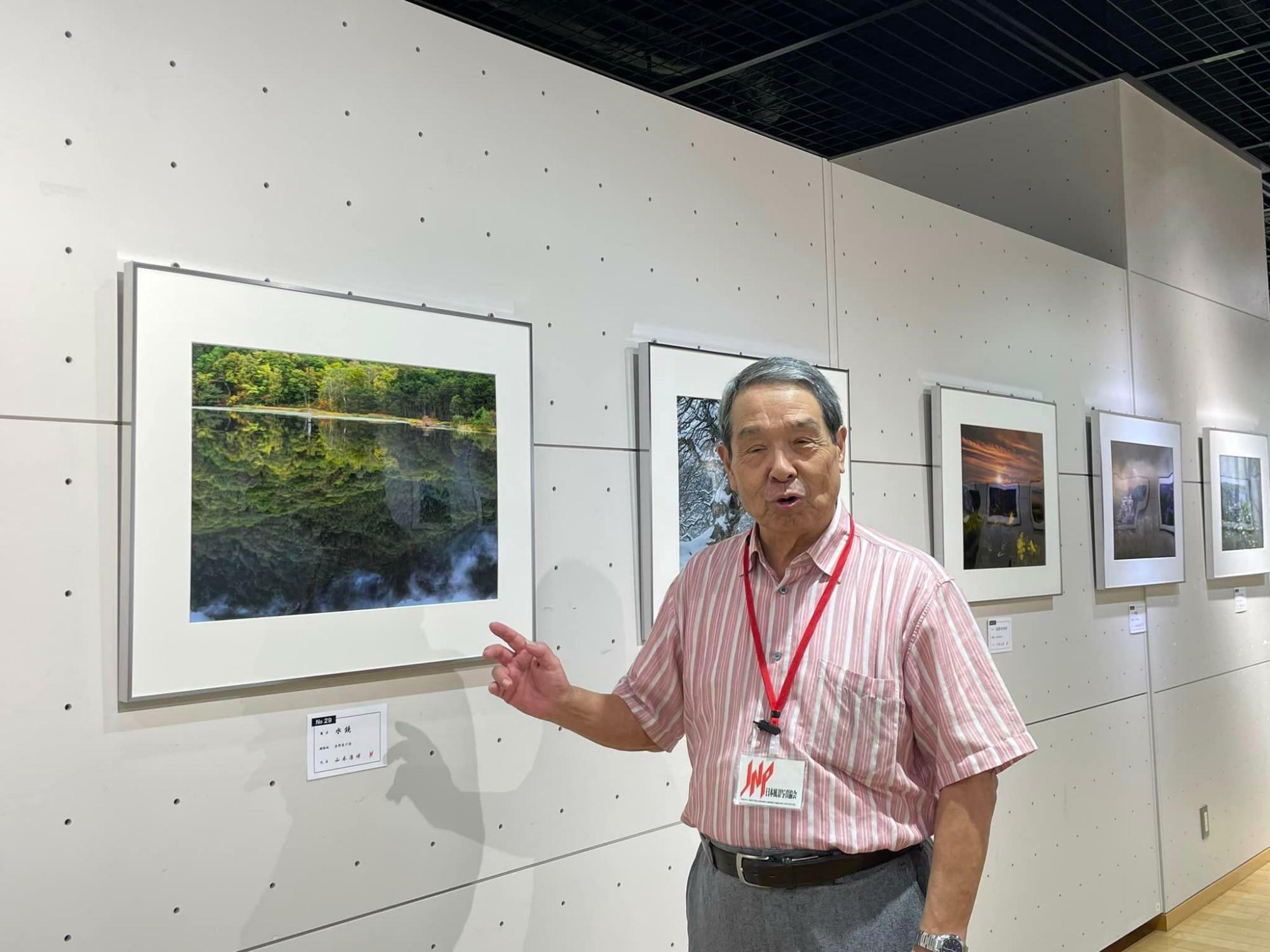 自ら撮影した写真付いて説明していただいた、会員の山本康博さん。