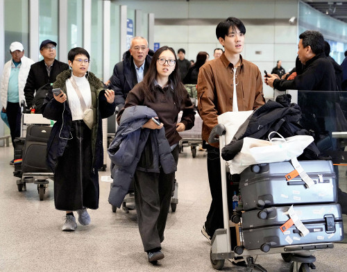 羽田空港から北京首都国際空港に到着した乗客