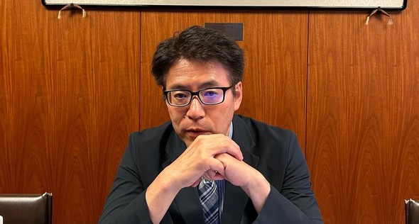 日韓関係の専門家である中戸祐夫氏のインタビュー内容を伝える写真