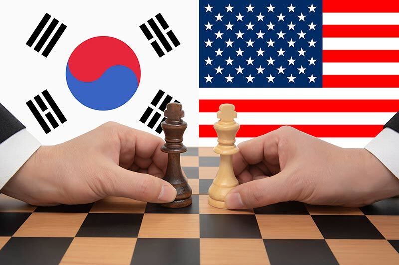 米国と韓国の製造業投資協力の概念を示すドル紙幣と成長グラフのイメージ