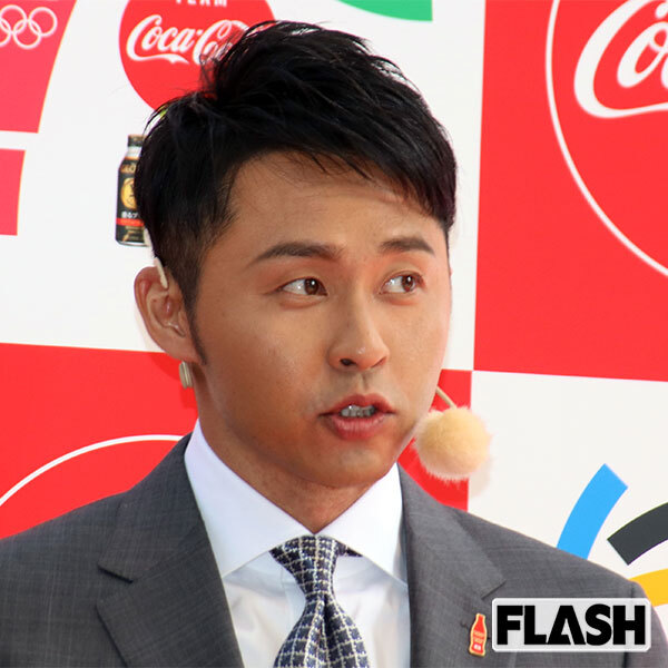 不倫疑惑が報じられた元競泳選手・北島康介と、妻で元歌手の千紗氏のツーショット写真。