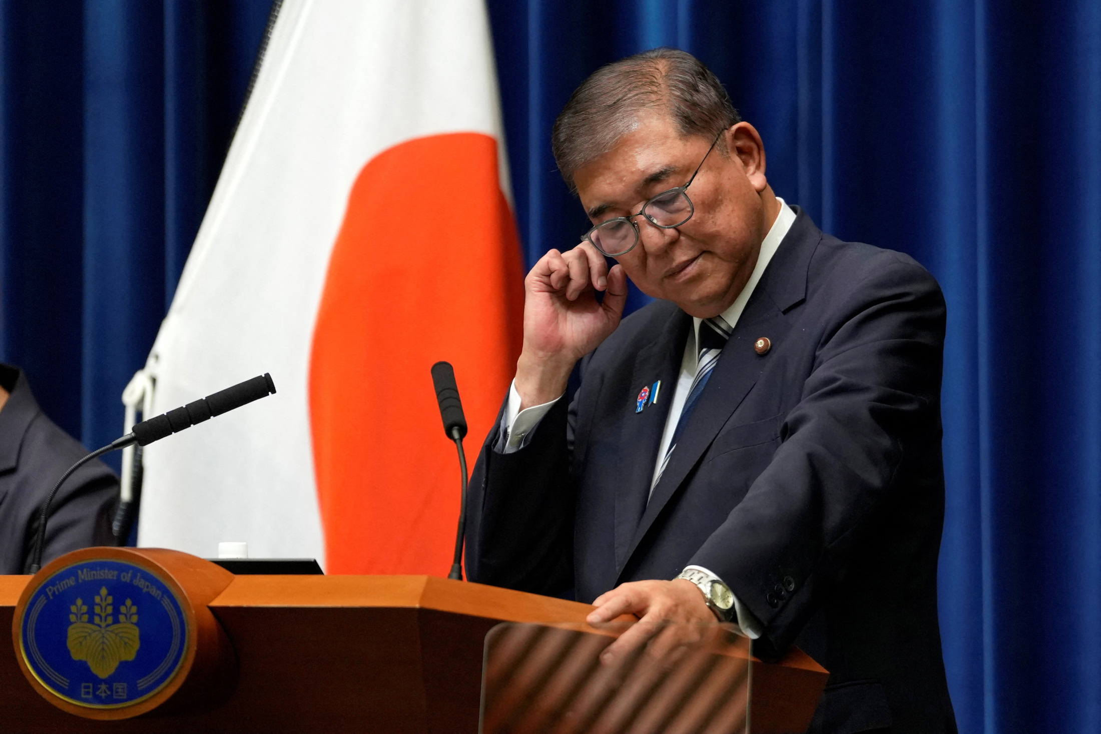石破茂首相が緊急記者会見で辞任の意向を表明する様子、2025年9月7日
