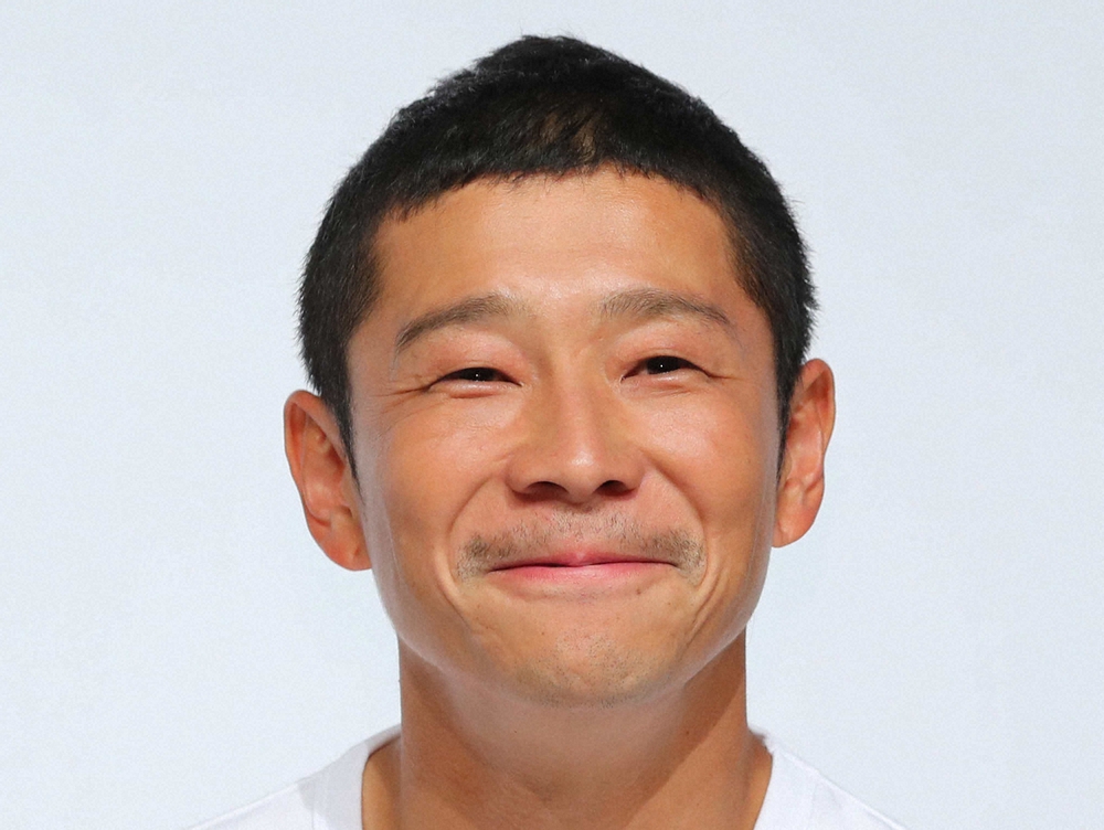 前澤友作氏が自身のSNSでメガヨットの維持費に関する松浦勝人氏の投稿に言及している様子。