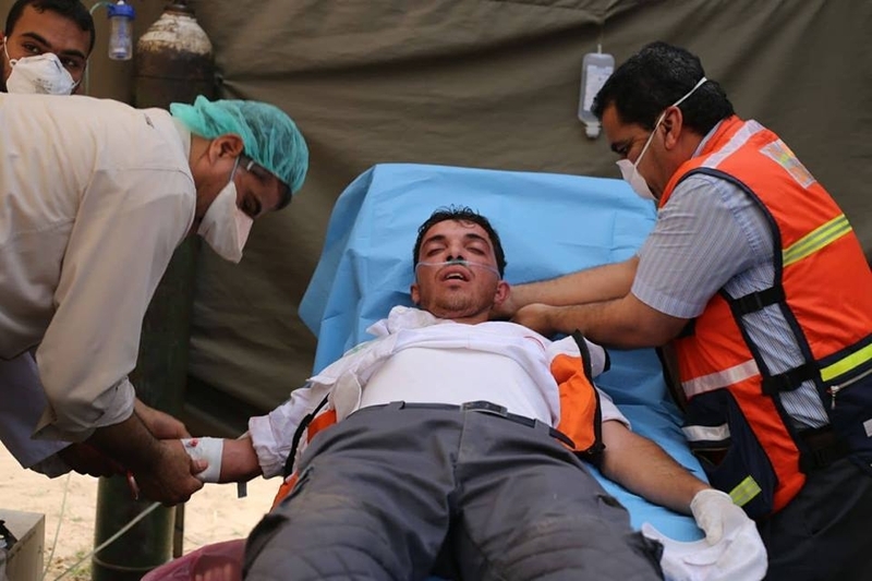 国境デモで負傷した救急隊員（パレスチナ人権センター・提供）