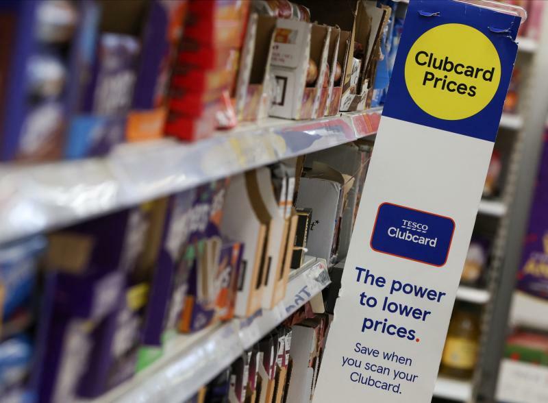 Clubcard branding is seen inside a branch of a Tesco Extra Supermarket in London, Britain, February 
