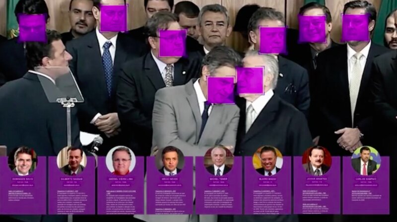 ブラジルの「Reclame Aqui」によるブラック政治家探知アプリの紹介ビデオより。顔認証と過去の違法行為のデータをリンクさせ、スマホを向けるだけで候補者の