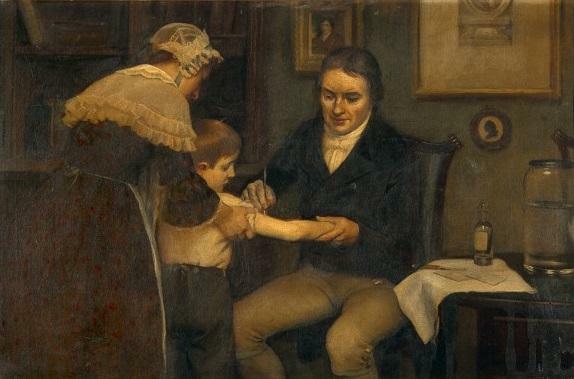 ジェンナーが8歳の少年ジェームズ・フィップスに最初のワクチン接種を行う様子 1796年5月14日（Wikipediaより）