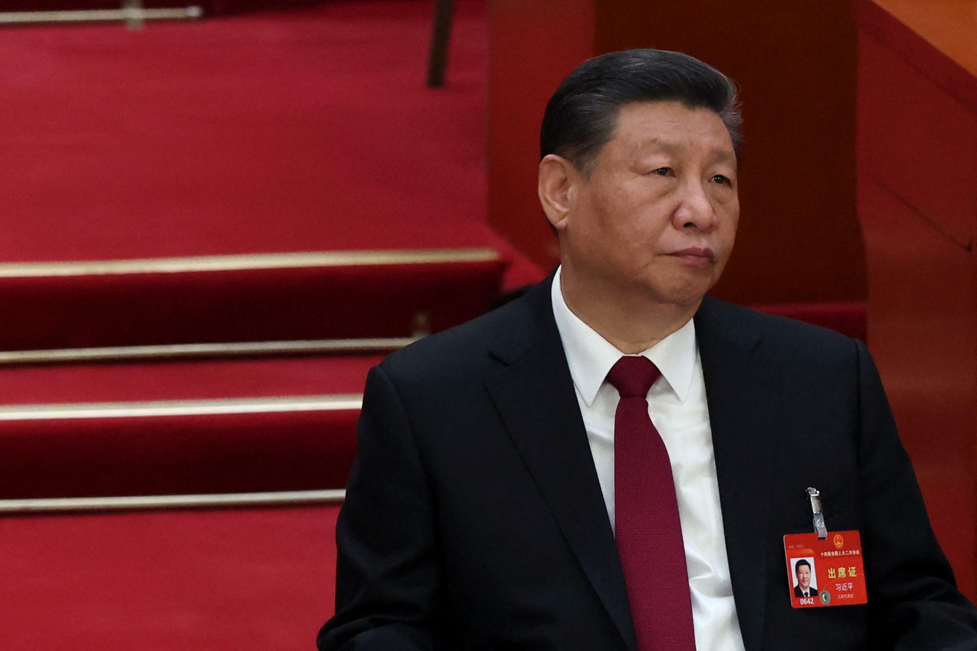 全人代開会式に出席した習近平国家主席（2024.3.5）。その体制のもとで中国では‘愛国’がそれまで以上に鼓舞されてきたが、‘愛国’も基本的には共産党の許容範囲でのみ認められる。