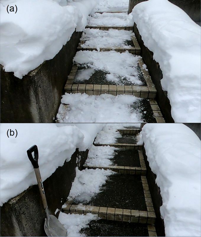 図1 家の前の階段の雪かき。人の通り道だけを作れば雪かきの負担が少ない（筆者撮影）