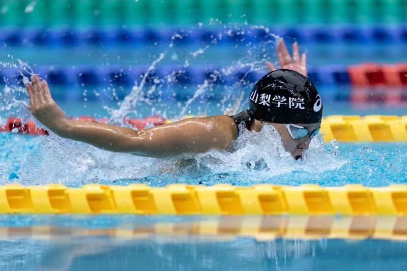 9月17日、女子50mバタフライS15に出場する聴覚障害の齋藤京香。ブラジルでのデフリンピックでは100mバタフライで金メダルを獲得した　写真・PARAPHOTO/秋冨哲生