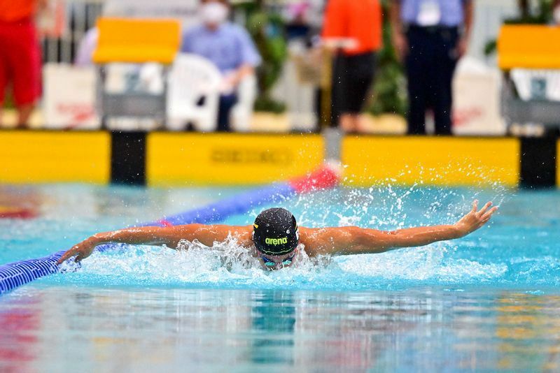 100mバタフライ（S11）で木村敬一を制して優勝した富田宇宙（EY ジャパン）　写真・日本パラ水泳連盟