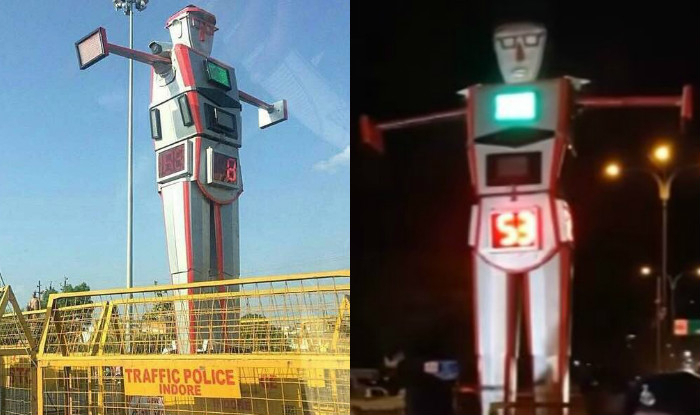 インドールの街で交通整理をしながら監視するロボット