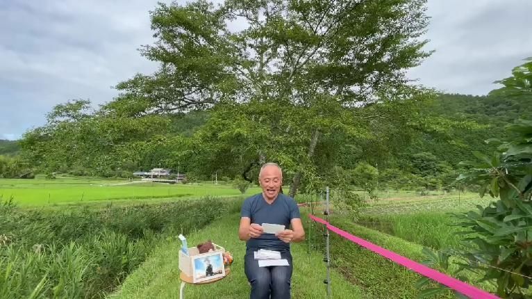 「ほっこりカフェ」の堀内圭三さんのメモリアル動画（筆者撮影）