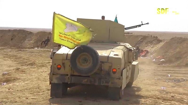 シリア南東部のISの最終拠点一帯で戦闘を続けるシリア民主軍（SDF）部隊。(SDF映像）