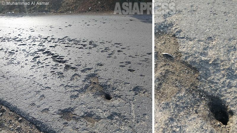 道路には着弾の痕が残っていた。アスファルトにはいくつもの穴があき、破片がまだめり込んだままだった。標的となったバイクの男は炸裂したミサイルで即死。遺体はバイクとともにバラバラになって肉片だけが飛び散っていたという。（2021年12月、シリア・イドリブ・撮影：ムハンマド・アル・アスマール）