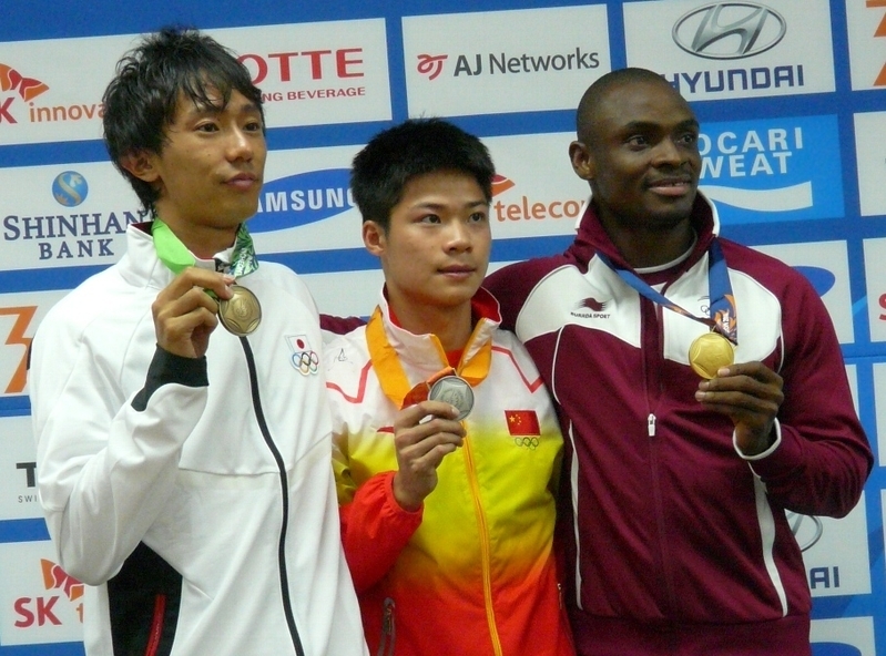 2014年アジア大会男子100ｍのメダリストたち。左から３位・高瀬慧、２位・蘇炳添、１位・オグノデ＜筆者撮影＞