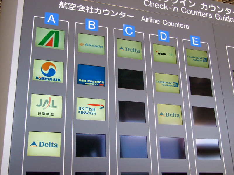 2007年当時のチェックイン場所を示す案内版（成田空港第1ターミナル北ウイングにて筆者撮影）