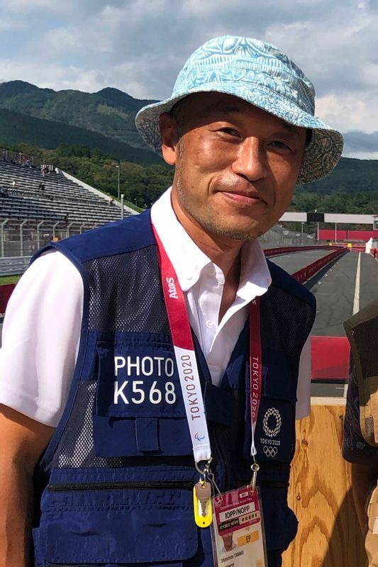 スポーツカメラマン歴22年の田中氏。野球はアマ、プロ全般を撮影しており、陸上、水泳、アルペンスキーも主要フィールドとする他、オリンピックでの撮影経験もある（田中氏提供）